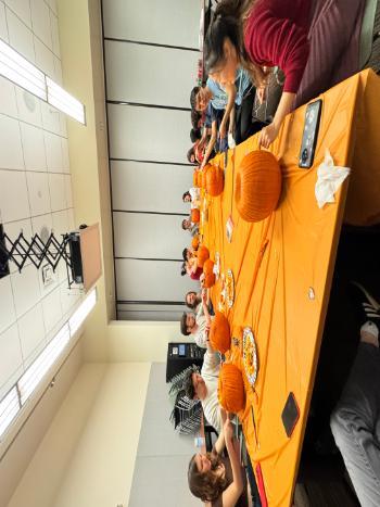 Shotokan karate members at their pumpkin carving social