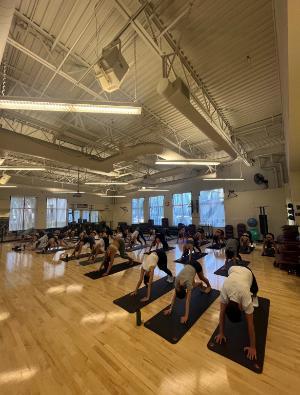 fitness class with 21 students in the multipurpose room