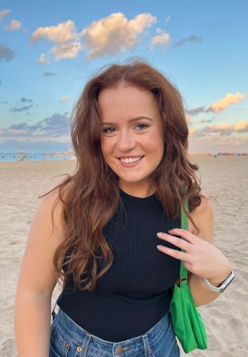 headshot of Maggie cycling instructor