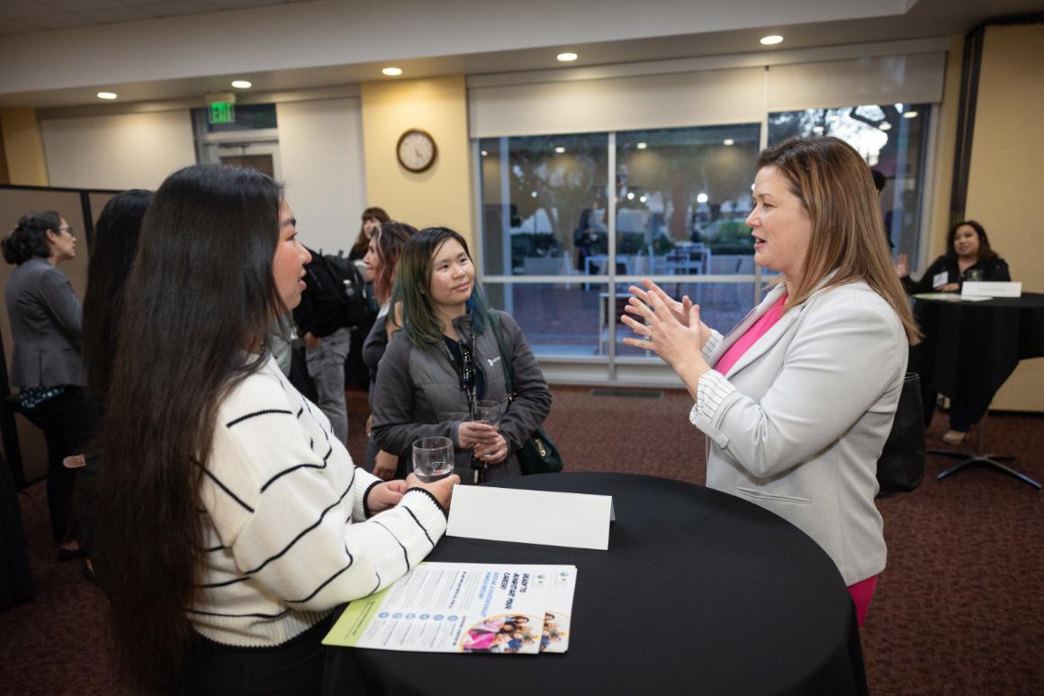 SCU students networking with officials at the Sustainability Career Meetup