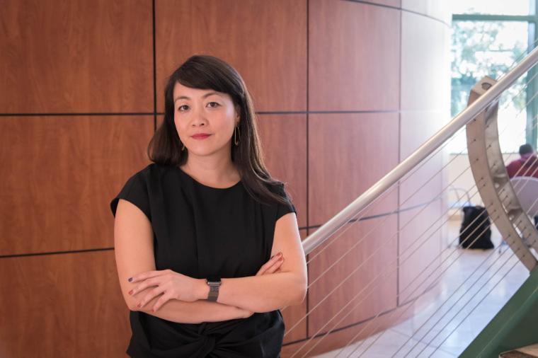 Thai standing in black shirt