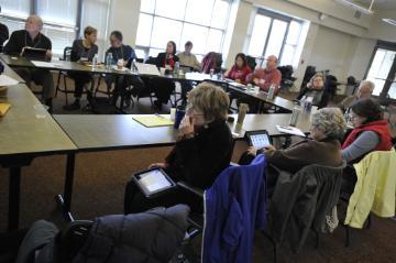 faculty sitting around for a seminar