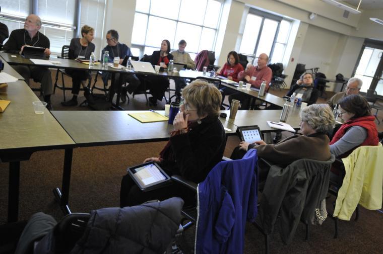 faculty sitting around for a seminar