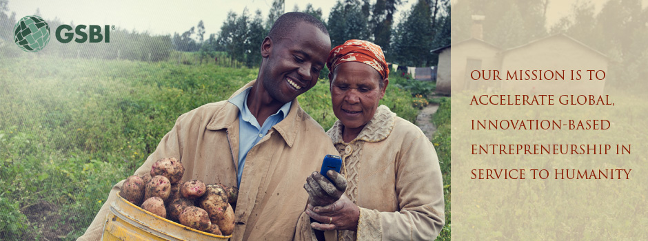 Two smiling people with crops, text: 