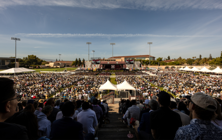 A crowd of thousands attend the 2025 Commencement ceremony.