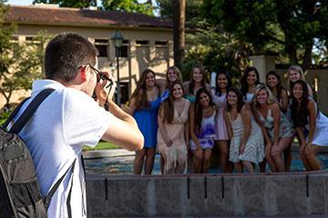 Student taking group photo 