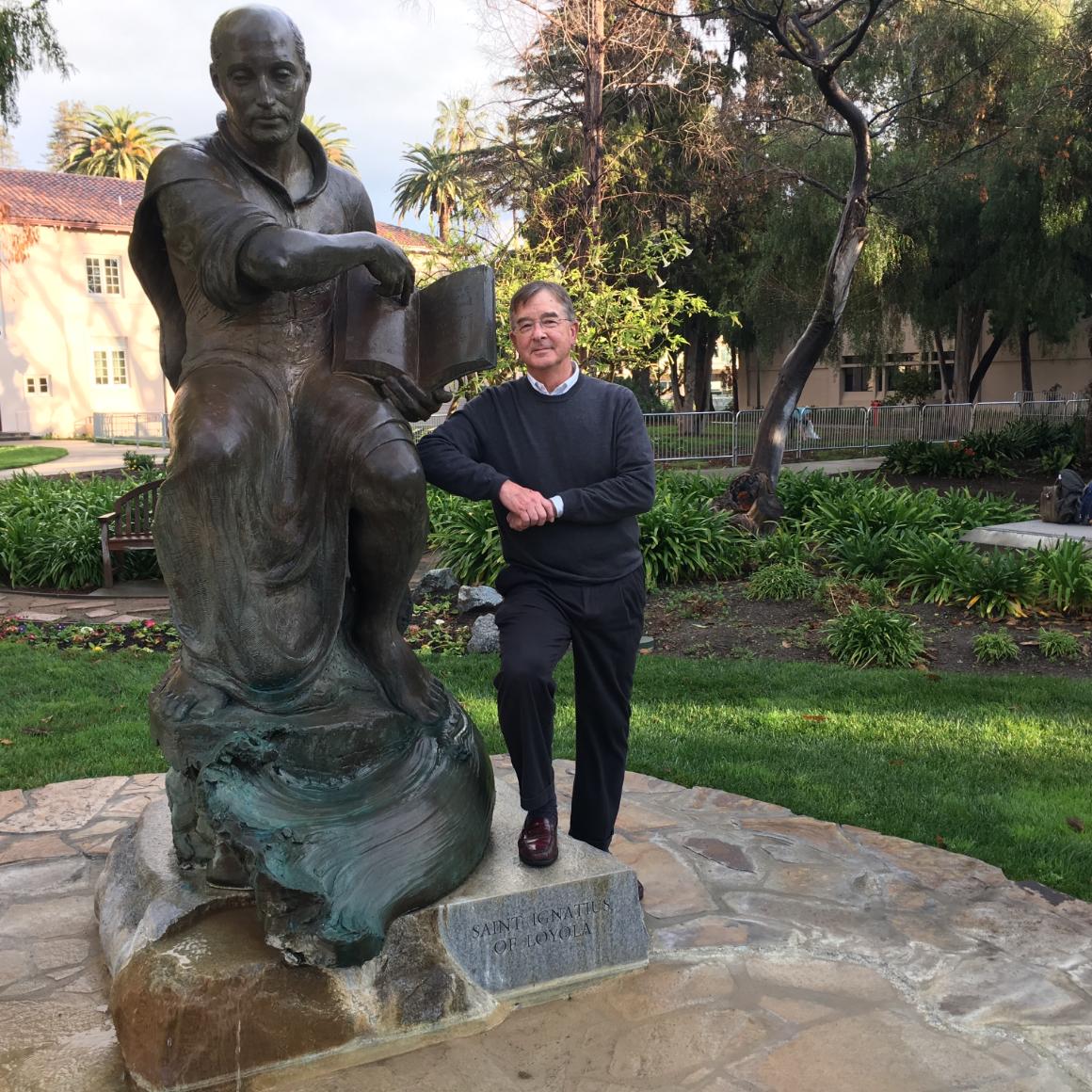 Lanny Vincent with SCU's statue of St. Ignatius image link to story