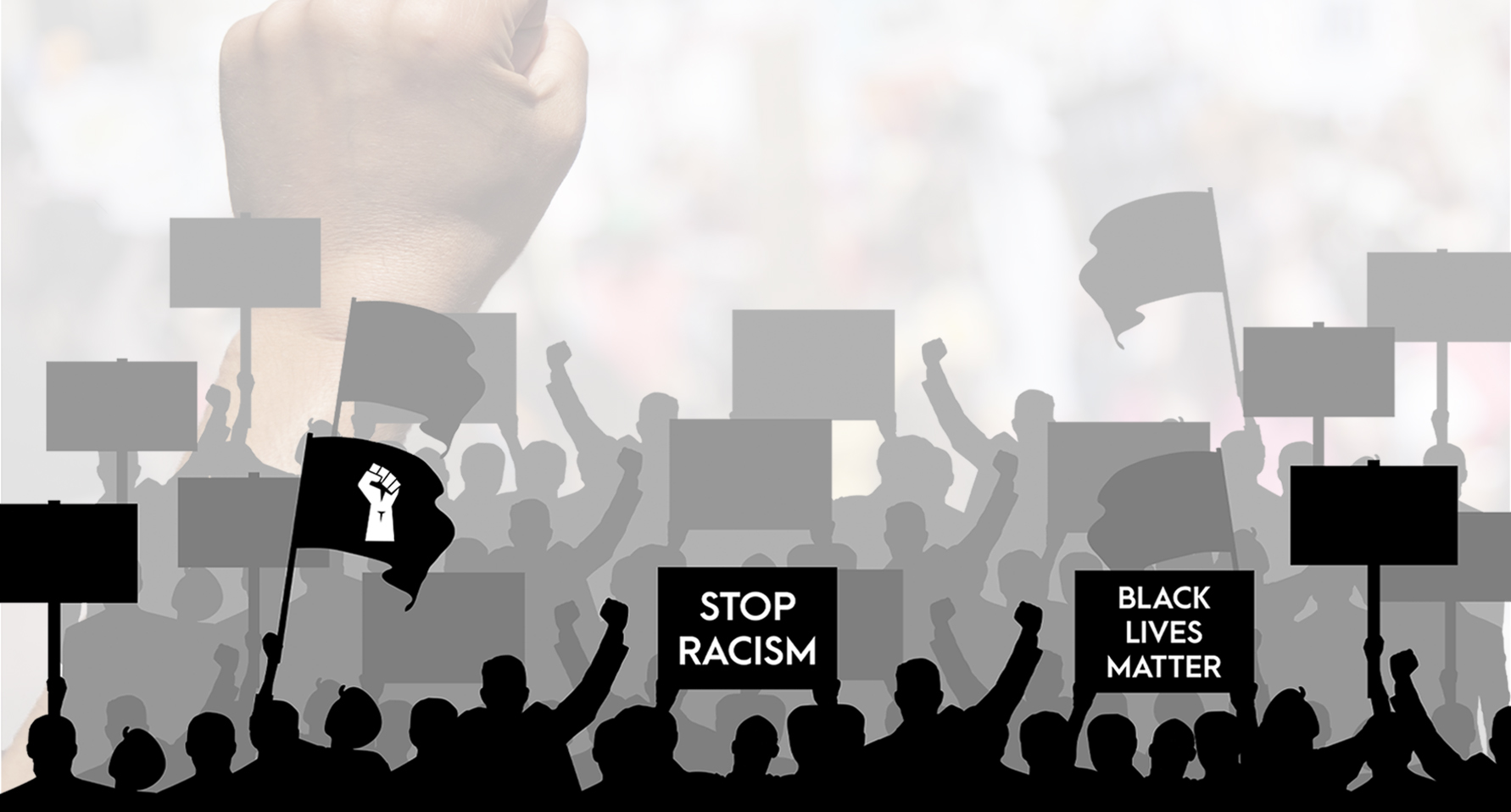 Silhouetted protesters with signs reading 