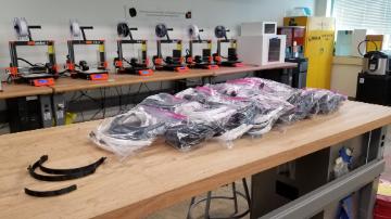 Face shield parts being printed in Maker Lab