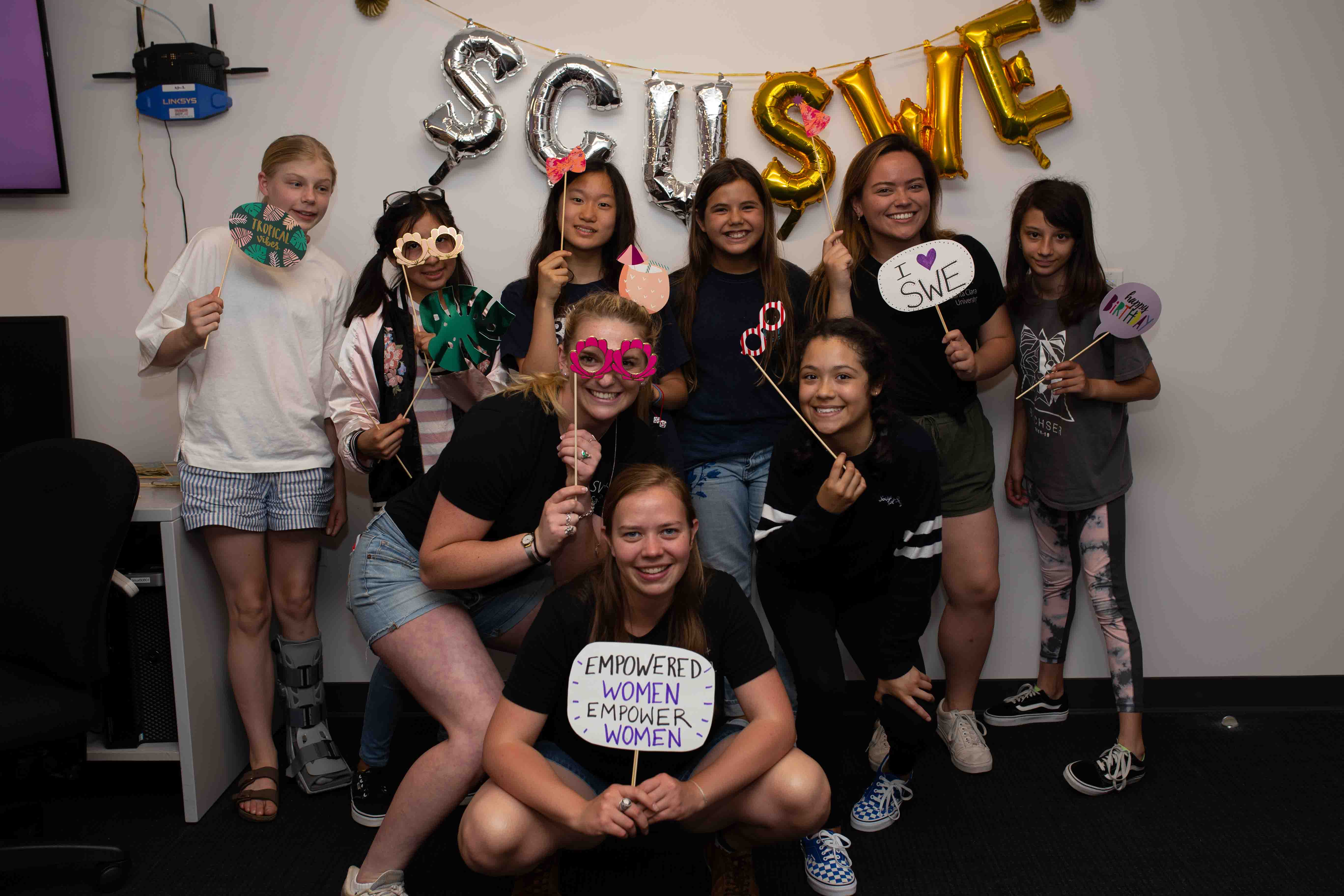 Group of women engineers pose for Girl Tech Day group photo during SWE++