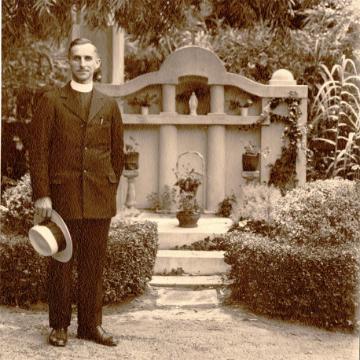 Father Arthur Spearman portrait in garden. 