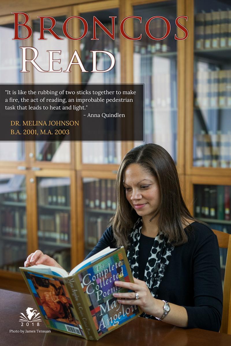 Melina sitting down and reading a book
